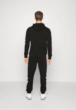 Hummel Hmllegacy- Trainingspak - Black -Heren Mode Boutique 427a88009c7d4edf96341a1ab7fc1520